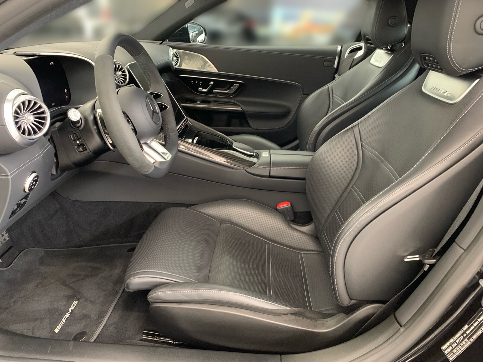 Ausstattungslinien und -Pakete:  AMG Aerodynamik-Paket,   AMG Night-Paket:  AMG Night-Paket II,   ENERGIZING Paket Plus,   Fahrassistenz-Paket:  Laderaum-Paket,   Memory-Paket:  Park-Paket mit Rückfahrkamera:  Premium Plus,   Spiegel-Paket:  USB-Paket PlusExterieur:  53,3 cm (21") AMG Schmiederäder im 10-Doppelspeichen-Design,   AIRPANEL,   AMG Einstiegsleisten mit "AMG" Schriftzug, beleuchtet und mit Wechselcover,   AMG Lichtinszenierung,   AMG Ride Control Fahrwerk:  Außenspiegel elektrisch anklappbar:  Bremssattel rot lackiert,   Designschlüssel mit Chromapplikationen,   DIGITAL LIGHT mit Projektionsfunktion,   Fahrzeug mit Linkslenkung,   Hintere Sensoren für Spurhalte-Assistent,   Identifikationsschild mit VIN-Nummer,   MAGIC VISION CONTROL,   Motor-Restwärmenutzung,   Motorsound-System (AMG Real Performance Sound),   Produktschutz Teilschutz,   Projektionsfunktion für Linien,   Radgroesse 21" Mischbereifung Variante 1 AMG,   Scheinwerfer und Heckleuchten abgedunkelt,   Schwarz lackierte Kühlerlamellen,   SPEED- + LOADINDEX 103Y XL + 104Y XL,   Steuer-Code - Funktion GSR-ISA,   Steuercode Demo Car,   Steuercode Demo Car MIG,   Steuercode Umstellung WLTP mit RDE,   Stoffverdeck schwarz:  Typkennzeichen auf Heckdeckel und Kotflügeln in Hochglanzschwarz,   Vorrüstung für Projektionsfunktion Animationen,   Vorrüstung für Projektionsfunktion SymboleInterieur:  Ambientebeleuchtung:  AMG Lenkradtasten,   AMG Performance Lenkrad in Leder Nappa / Mikrofaser MICROCUT,   AMG Zierelemente Carbon,   Automatische Restkofferraum-Abtrennung,   Bedienungsanleitung und Serviceinformation - deutsch,   Beifahrersitz mit Gewichtserkennung,   Cupholder,   Headbags im Fond,   Innenhimmel Stoff schwarz,   Klimatisierungsautomatik Thermotronic:  LEDER / NAPPA / SEMIANILIN,   Multikontursitze für Fahrer und Beifahrer,   Sonnenblende ausziehbar,   Steckdose im KofferraumMultimedia:  Android Auto:  Apple CarPlay:  Burmester® Surround-Soundsystem:  Digitales Radio:  Erweiterte Funktionen MBUX:  Fahrerdisplay,   Festplatten-Navigation:  Head-Up Display:  Headunit Länderset für ECE (NTG 7),   Kabelloses Ladesystem für mobile Endgeräte vorn:  Kommunikationsmodul (LTE) für die Nutzung von Digitalen Extras,   MBUX Augmented Reality für Navigation:  MBUX Multimediasystem:  MBUX Navigation Premium,   Mercedes-Benz Notrufsystem:  Remote Services Premium,   Smartphone Integration:  Soundpersonalisierung,   Sprache Kombiinstrument - deutsch,   Techn. Kommunikationsmodulvariante für ECE,   Vorrüstung für digitalen Fahrzeugschlüssel für Smartphone,   Vorrüstung für digitales Radio:  Vorrüstung für MBUX Entertainment Plus,   Vorrüstung für Navigationsdienste,   Vorrüstung Live Traffic Information:  Zentraldisplay:Komfort und Umwelt:  360°-Kamera:  Adaptiver Fernlicht-Assistent Plus:  Airscarf:  Aktiver Geschwindigkeitslimit-Assistent:  Aktiver Park-Assistent:  Aktiver Spurhalte-Assistent:  Aktiver Spurwechselassistent,   AMG SPEEDSHIFT MCT 9G,   Ausweichunterstützung (Ausweichassistent),   Erweitertes automatisches Wiederanfahren im Stau,   Fahrassistenz-System: Rettungsgassen-Assistent,   Gepäckraumklappen-Fernschließung,   Hands-Free Access,   Hinterachslenkung:  i-Size Kindersitzbefestigung Beifahrersitz,   Innen- und Außenspiegel automatisch abblendend,   ISOFIX Kindersitzverankerungen:  KEYLESS-GO mit flächenbündigen Türgriffen,   KEYLESS-GO Start-Funktion:  Kraftstofftanksystem für EU6d-Norm:  Lenkradheizung:  MBUX Interieur-Assistent,   Nothalt-Assistent mit Hands-off Spurwechsel Software,   Passive Personenanwesenheitserinnerung,   Sitzklimatisierung für Fahrer und Beifahrer:  Streckenbasierte Geschwindigkeitsanpassung,   Verkehrszeichen-Assistent:Sicherheit:  Aktiver Abstands-Assistent DISTRONIC:  AMG Hochleistungs- Verbundbremsanlage,   Deaktivierung Schließrückmeldung über Fanfare,   Distronic Plus Querunterstützung (DTR+Q),   Einbruch- und Diebstahlwarnanlage mit Vorrüstung für Kollisionserkennung:  Fingerabdrucksensor,   Fond-Sicherheitsgurt mit Gurtkraftbegrenzer,   Fondgurt-Statusanzeige im Instrumenten-Display,   GUARD 360° Fahrzeugschutz Plus,   Innenraumabsicherung,   PRE-SAFE ® -System:  Rating Länderset EURO-NCAP,   Reifendruckkontrolle (RDK):  Sidebags:  Vorrüstung für GUARD 360° ServicesWeiteres:  AMG-FAHRZEUG-BAUMUSTER PERFORMANCE/HIGH,   COLDEND TECHNIK TYP 0,   CONTROL CODE WLTP 3RD ACT,   HOTEND TECHNIK TYP II-A,   Kältemittel 1234yf.